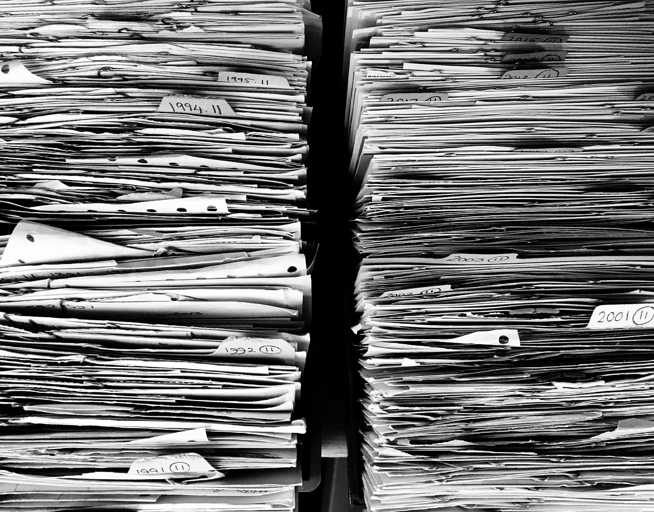 Files, paper, office — Authentic Connections Made Simple: How Love In One Click.Com Transforms Online Dating